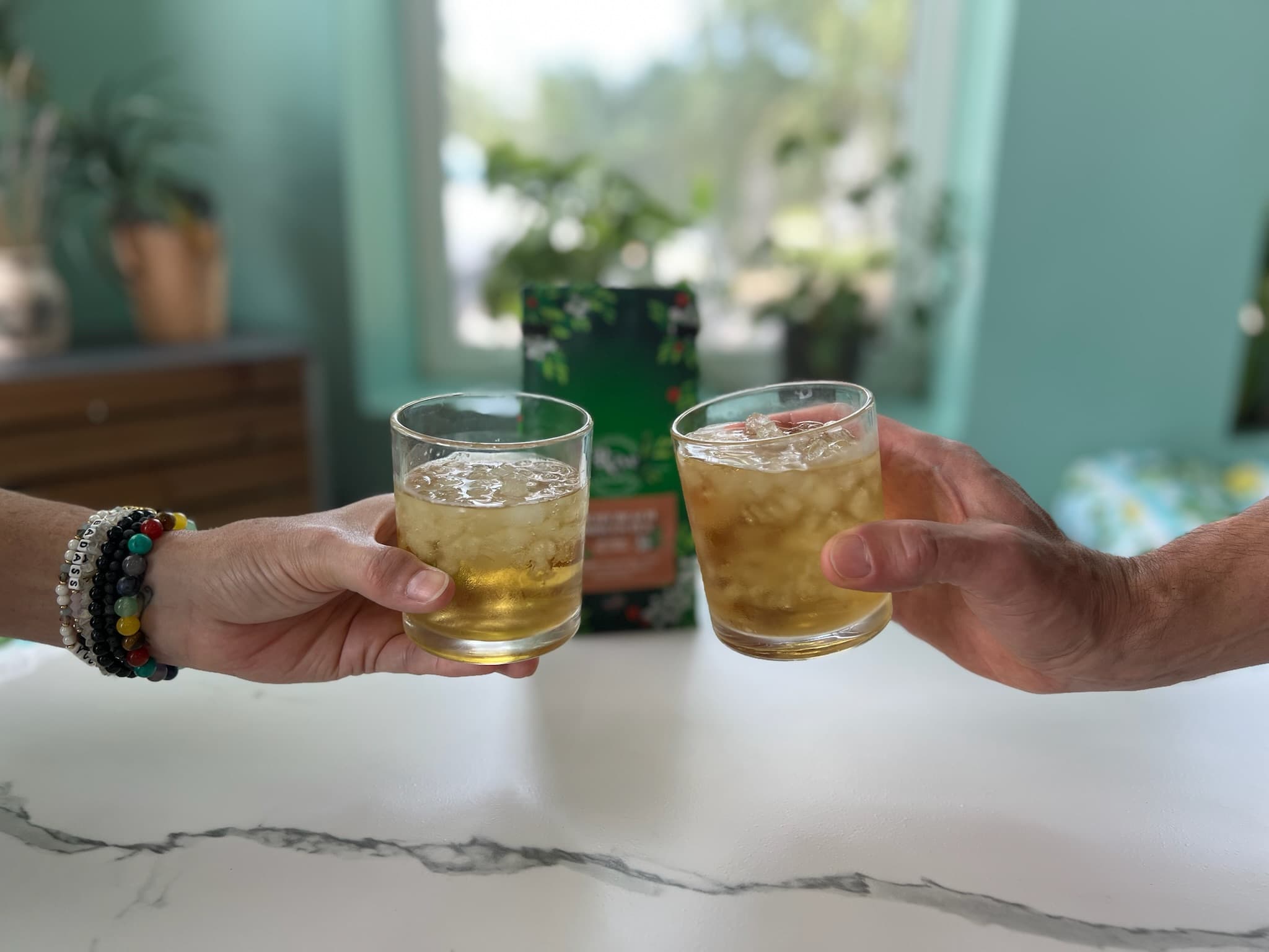 Friends toasting with yaupon tea