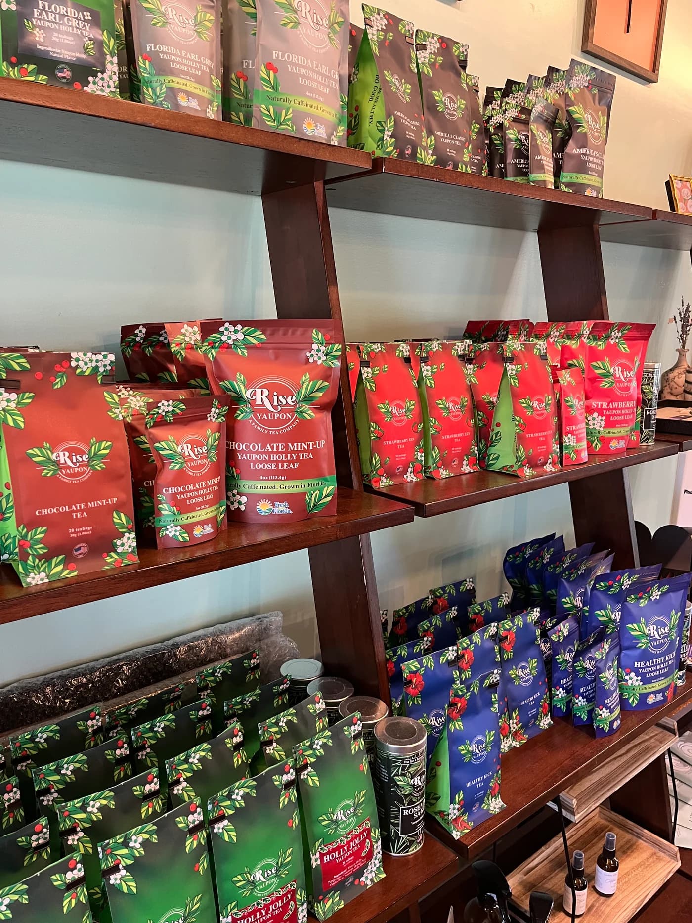 Rise Yaupon tea blends on the shelves of the factory store