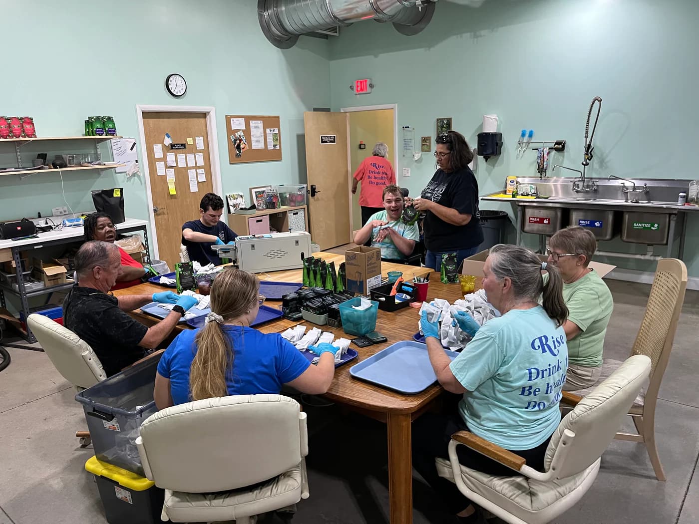 The Rise Yaupon team hand-crafting tea on the production floor